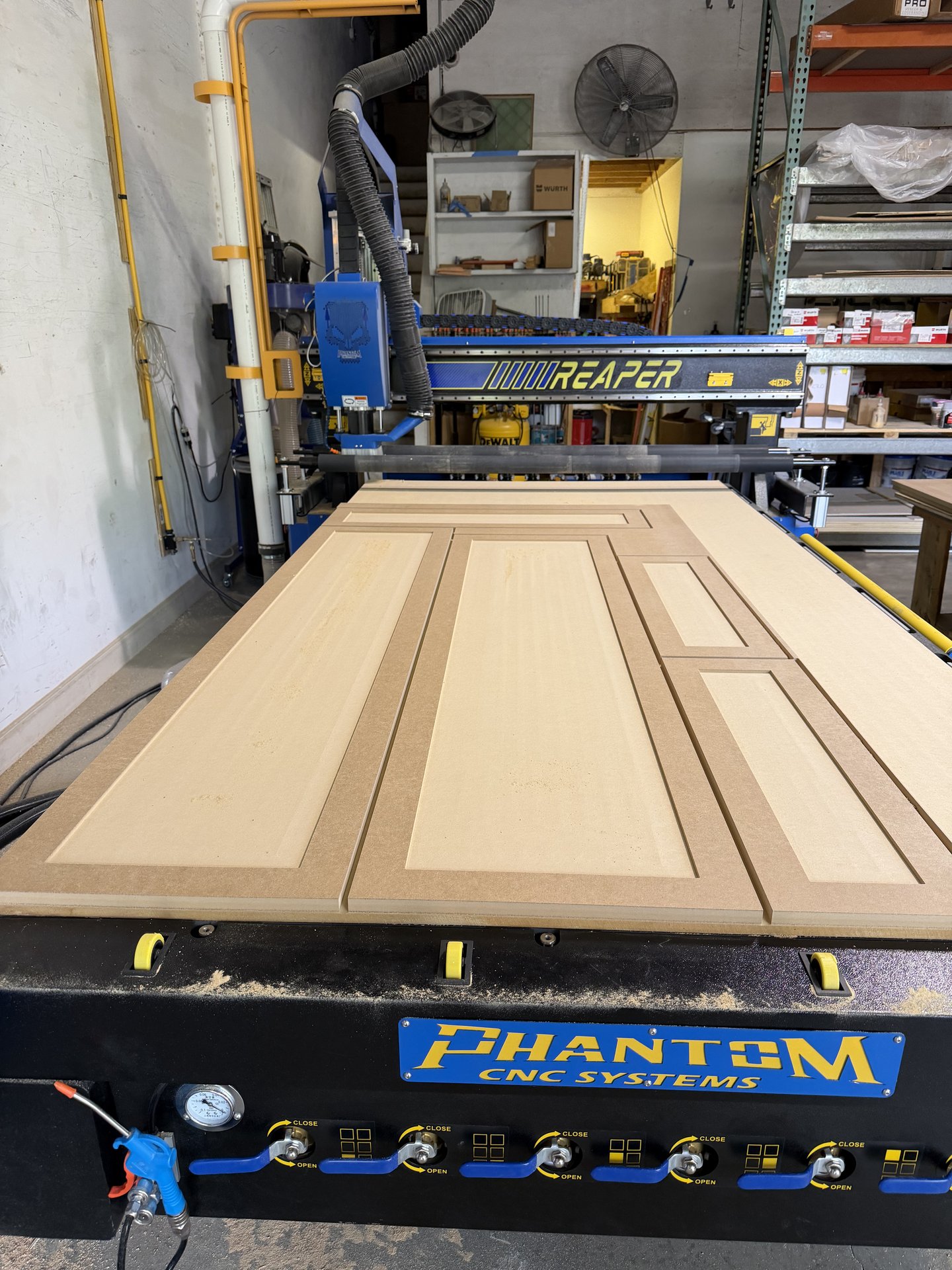 Phantom CNC router cutting raised panel doors in-house